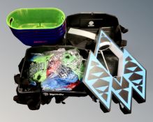 A collection of pub crates, inflatable guitars, Jägermeister crates etc.