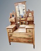 A 19th century satin wood sunk centre dressing chest