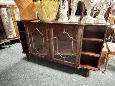 A reproduction mahogany bookcase (length 151cm)