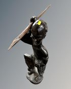 A large African wooden carved warrior figure