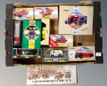 A box containing die cast vehicles including Corgi Classics, Eddie Stobart example etc.