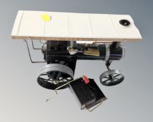 A Mamod steam tractor.