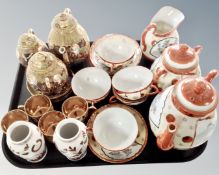 Two Japanese 20th century gilded and holophane tea services.