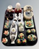 A tray of early 20th century Japanese, Continental and Poole pottery condiment pots and novelties.