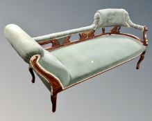 A Victorian inlaid mahogany chaise longue in green buttoned dralon