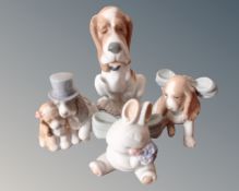 Four Nao figures, three dogs and a rabbit.