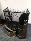 A folding metal spark guard together with four piece cast companion set on stand,