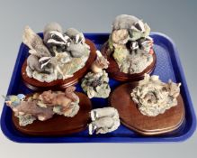 A tray of Border Fine Arts figures, some on plinths, badger families, squirrel etc.