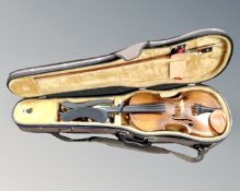 A 20th century violin labelled Joseph Guarnerius fecit Cremonae Anno 1786, two-piece 14