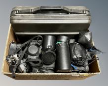 A box of camera bag, Yashica cameras, lenses and accessories,