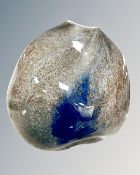 A Kosta Boda mottled glass vase, signed to base, height 17cm.