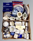Two boxes of Ringtons china, blue and white plates, commemorative cups, teapots etc.