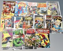 A collection of vintage comics including Marvel and DC issues including The Flash,