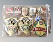 A collection of 10 police and police volunteer pin badges.