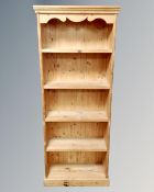 A pine open bookcase.