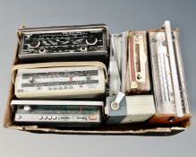 A box of seven transistor radios to include Hacker Sovereign II and Sovereign III, Sanyo, Bush,