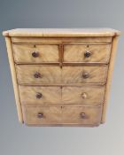 A Victorian mahogany two-over-three bow fronted chest of drawers.