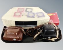 A Bose Wave music system with remote together with vintage cameras and six assorted crowns