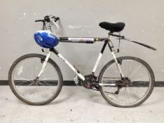 A Rebel Warrior mountain bike with helmet.