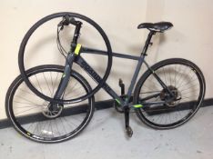 A Boardman Pro road bike with extra tire.