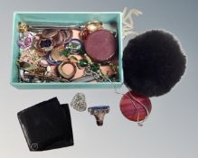 A small blue tray of misc.