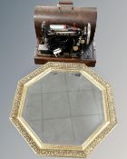 A vintage Singer sewing machine converted to electric, in case,