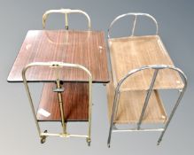 Two mid-20th century tubular metal two tier folding tea trolleys.