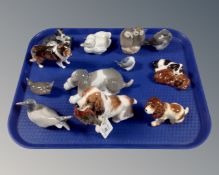 A Royal Doulton Spaniel figure holding a pheasent,