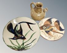Two studio pottery plates by Puigdemont pottery decorated with fish together with a pottery jug