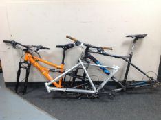 A GT Aggressor competition bike frame together with an Apollo Radar full suspension bike frame and