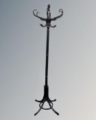 A painted bentwood hat and coat stand.