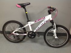 A Carrera Luna girl's front suspension mountain bike.