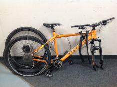 A Carrera Vengeance aluminium frame off-road performance bike frame with two rear wheels,