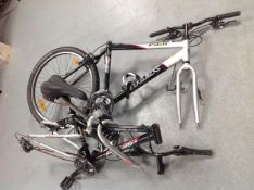 A Trek 3500 bike frame together with an Apollo FS26S aluminium tubing bike frame.