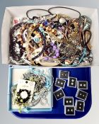 A tray containing a quantity of assorted costume jewellery together with eight pairs of Diamante