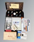 A tray containing boxed vintage Banda carpet bowls, a boxed set of 59 dominoes,