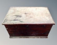 An antique pine blanket chest.