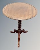 A Victorian mahogany circular tripod wine table, with twist column support, height 67cm.