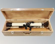 A Janik Terrestrial telescope with tripod, in box.