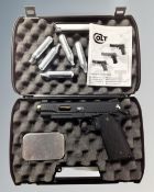 A Colt 4.5mm .177 calibre gas powered BB gun in case.