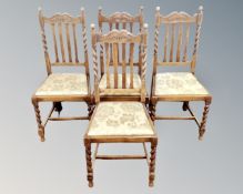 A set of four 20th century oak barleytwist dining chairs.
