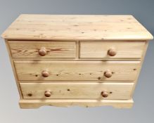A pine chest of four drawers, width 100cm.