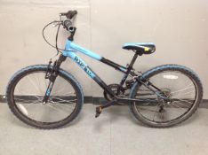 A Riptide Concept front suspension boy's mountain bike.