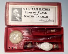 A vintage Sir Hiram Maxim's Pipe of Peace and Maxim inhaler, in original box.