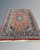 A Keshan carpet, Central Iran, 203cm by 292cm.