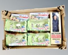 A box containing Action Man action sailor together with four Britains Task Force soldier sets,