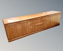 A 20th century teak G Plan wall unit base,