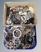 A tray containing a large quantity of assorted costume jewellery.