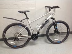 A Norco Storm front suspension mountain bike.