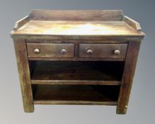 An oak three tier serving stand, fitted with two drawers,